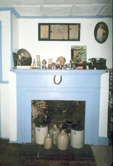 Kitchen fireplace with draft horse shoe found in the chimney.